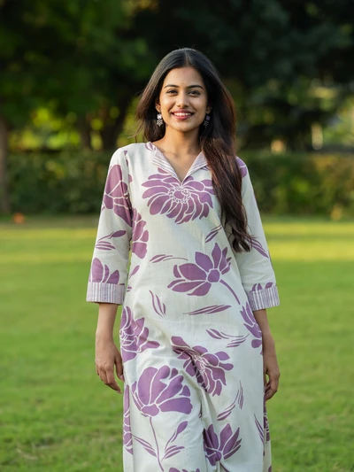 Purple floral kurta with striped trousers